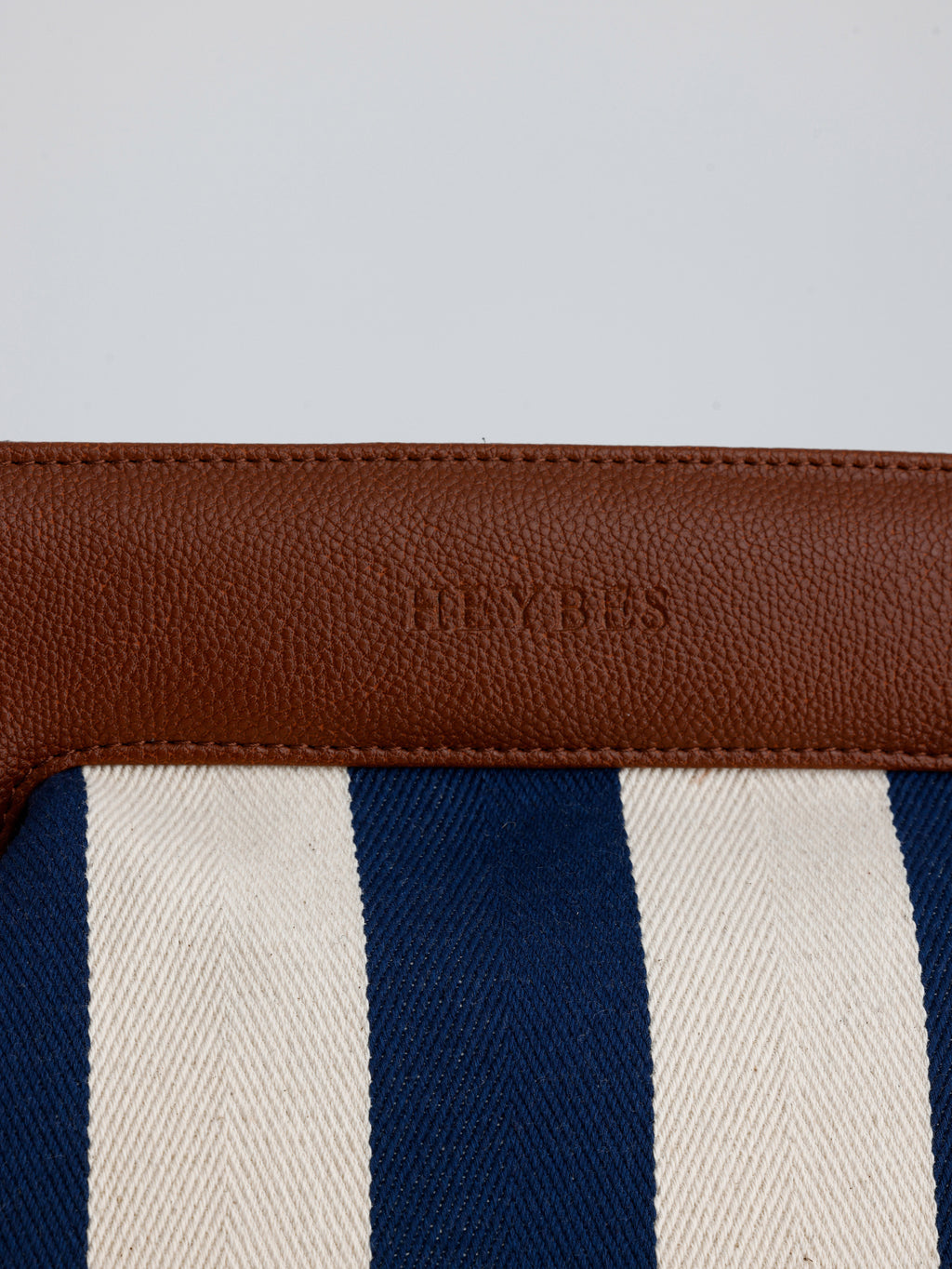 Heybes Kadın Çizgi Desenli Kanvas Clutch El Çantası