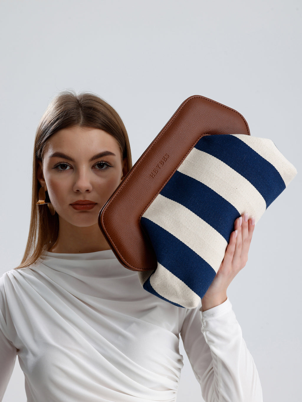 Heybes Kadın Çizgi Desenli Kanvas Clutch El Çantası