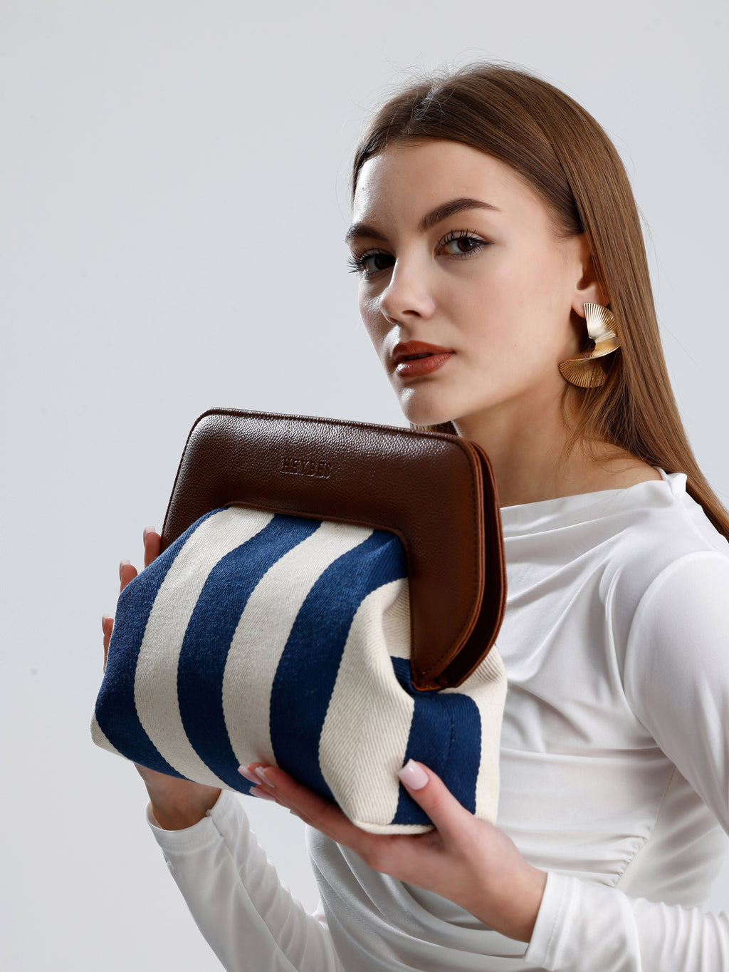 Heybes Kadın Çizgi Desenli Kanvas Clutch El Çantası